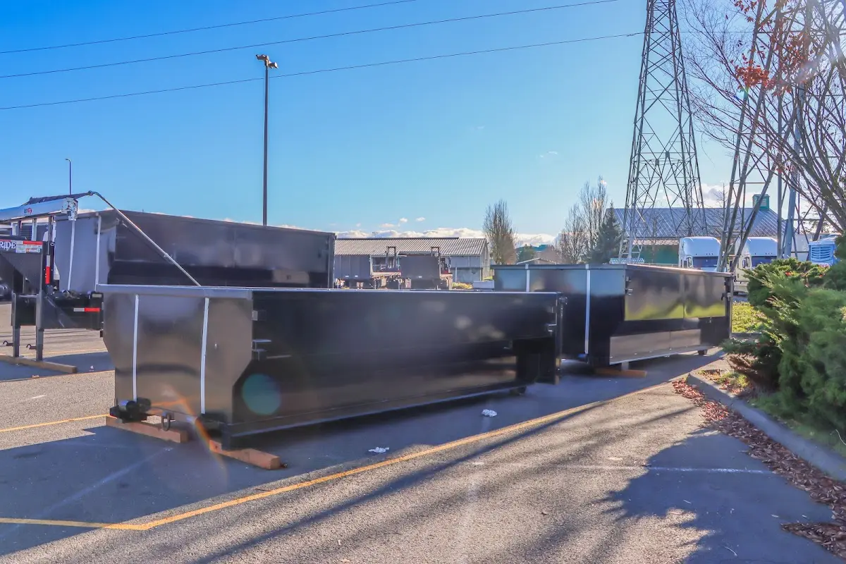 Roll-off dumpster ready for waste disposal at job site for 3 Yard Dumpster Rental in Sayre